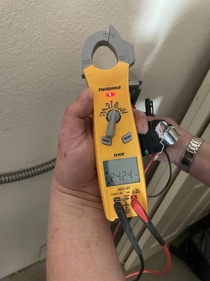 Voltage testing with clamp meter during Recessed Lighting Installation in Gloucester City